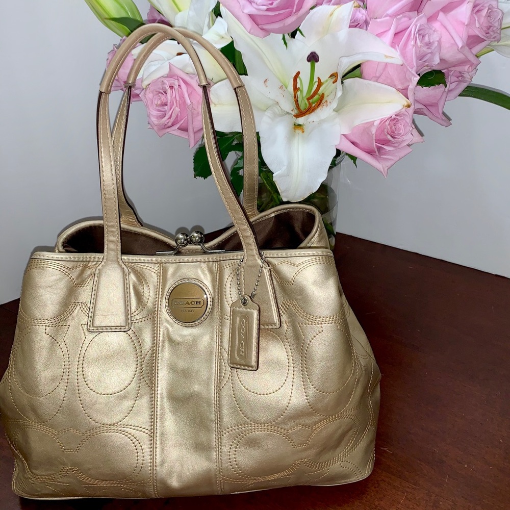 Gold coach purse